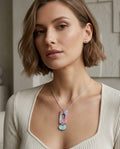 Collar de resina marmolada rosa y turquesa con colgante doble
